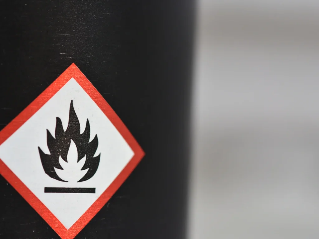 Close-up image of a flammable caution sticker.
